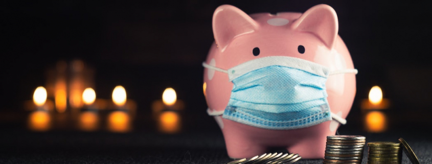 Piggy bank wearing a surgical mask